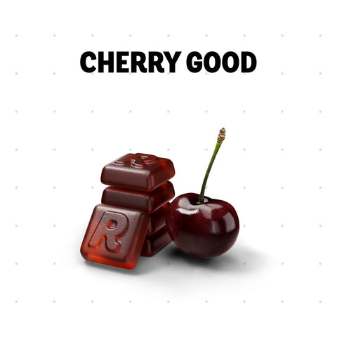 Three glossy red chocolate letters with the letter 'R' embossed on them are shown next to a whole dark red cherry on a white background, with the text 'CHERRY GOOD' above.