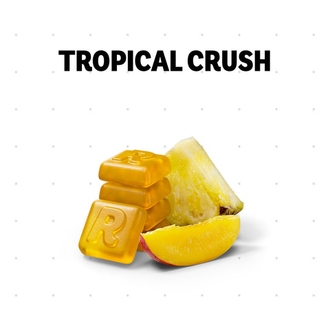 Tropical Crush flavor bars and a pineapple slice on a white background with the text 'TROPICAL CRUSH' above them.